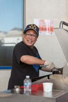 Vice Principal Johnny is a sausage-grilling expert.