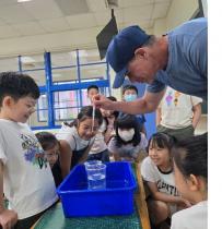 Children discovered the magic of surface tension through simple and fun hands-on experiments.